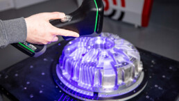 KSCAN Handheld 3D Scanner scanning an item with 3D scanning dots | T3DMC