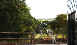 Rear view of Jacob Chandler's The Final Furlong Sculpture in steel & bronze | T3DMC