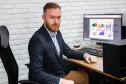 T3DMC sales representative at desk providing UK support for 3D scanning solutions